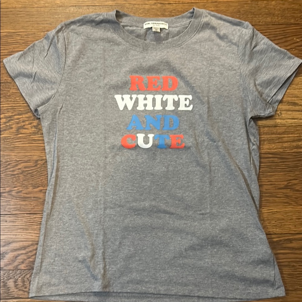 As in urban riot  Gray Graphic Tee with Red, White, and Blue Text